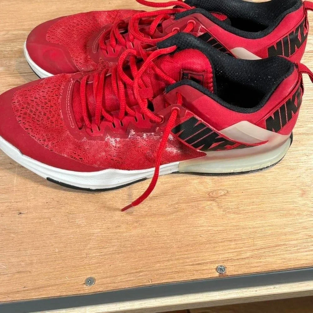 Red sneakers in US 12 Nike